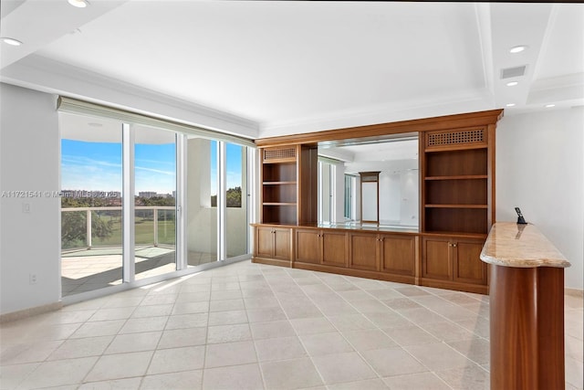 unfurnished living room with light tile patterned flooring