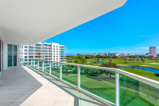 balcony featuring a water view