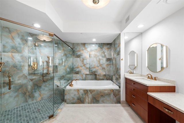 bathroom featuring tile patterned floors, vanity, and plus walk in shower