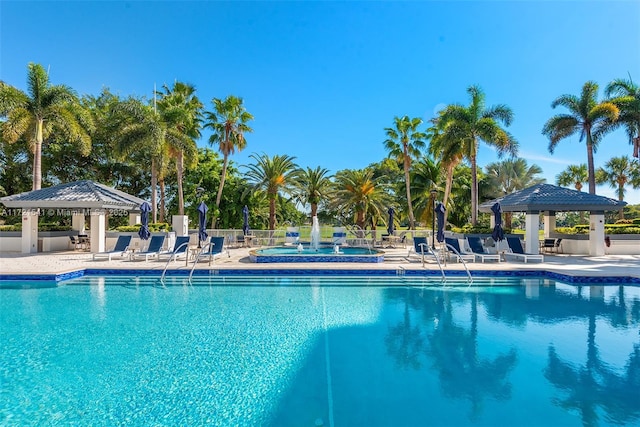 view of pool with a gazebo and a patio