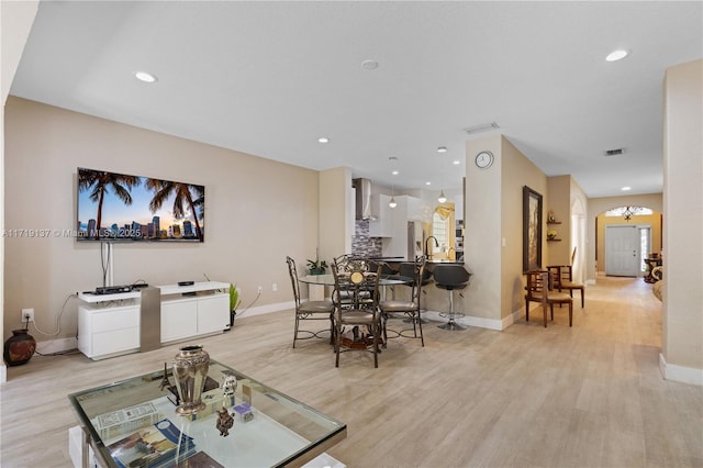 living room featuring light wood-type flooring