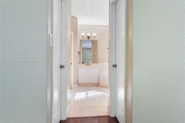 hallway featuring sink