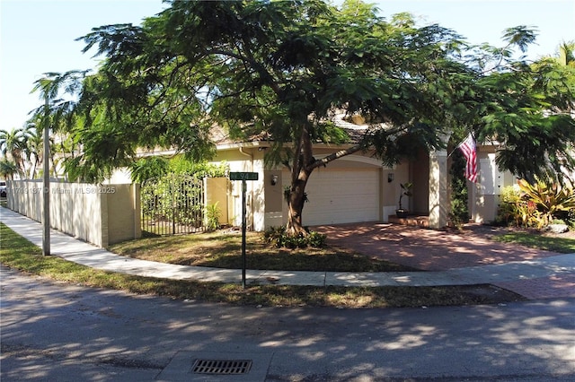 view of front of home with a garage