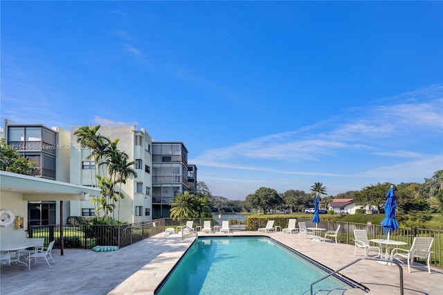 view of swimming pool featuring a patio area