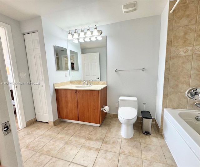 bathroom with toilet,  shower combination, tile patterned flooring, baseboards, and vanity