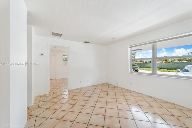 view of tiled spare room