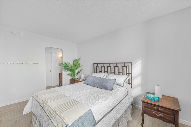 bedroom with a textured ceiling