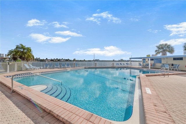 view of swimming pool featuring a patio