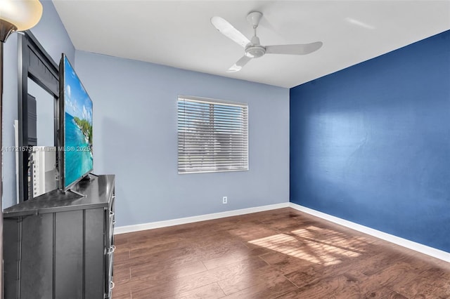 interior space featuring dark hardwood / wood-style floors and ceiling fan