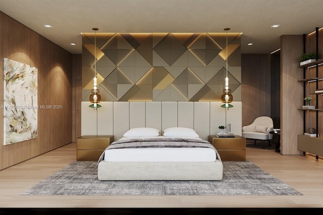 bedroom with light hardwood / wood-style flooring