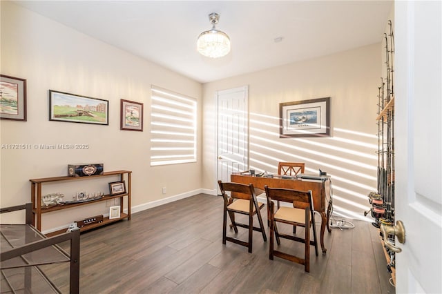 dining room with dark hardwood / wood-style floors