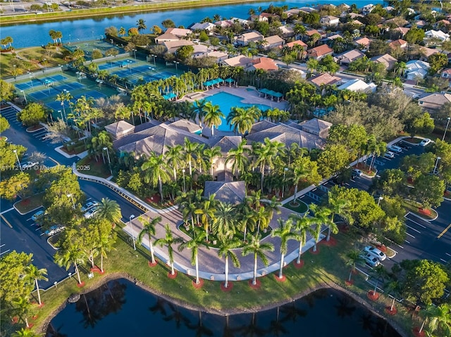 birds eye view of property featuring a water view