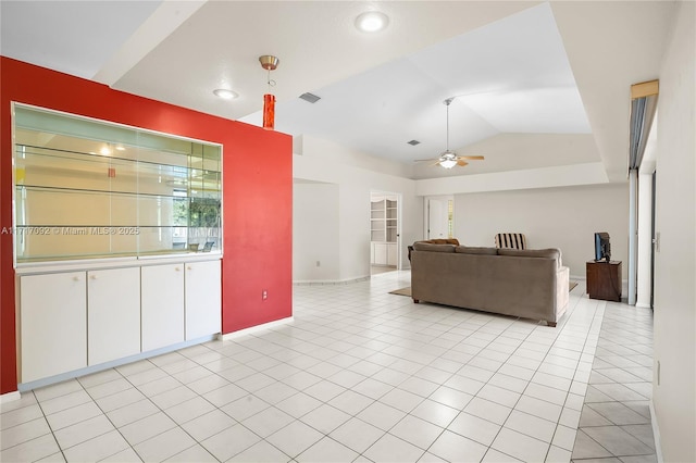 tiled living room with vaulted ceiling and ceiling fan