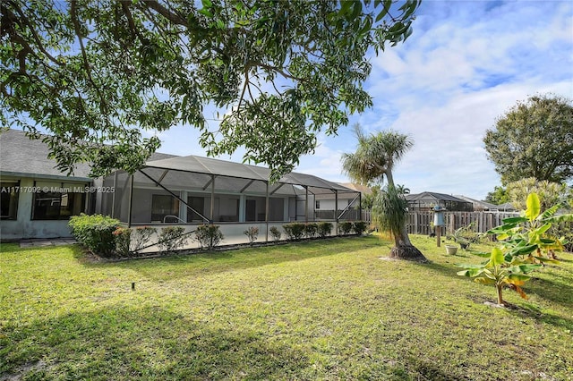 view of yard featuring a lanai