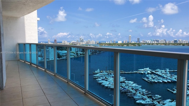 balcony featuring a water view