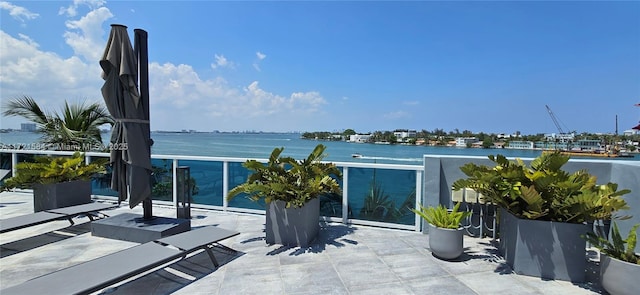 view of patio / terrace with a water view