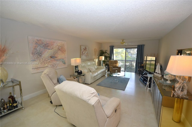 tiled living room with a textured ceiling