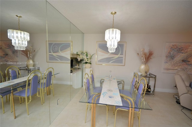 dining area with a notable chandelier