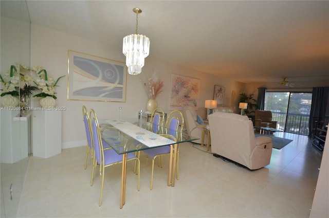 dining space with a chandelier