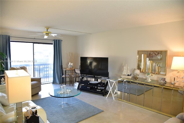 living room featuring ceiling fan