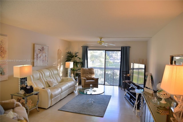 living room featuring ceiling fan