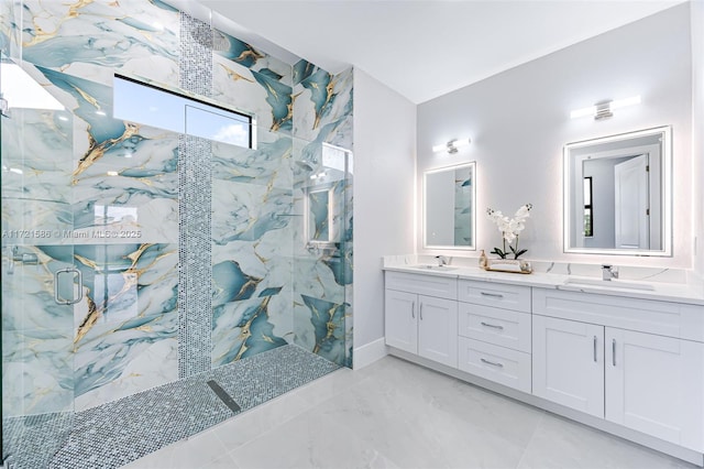 bathroom with vanity and tiled shower