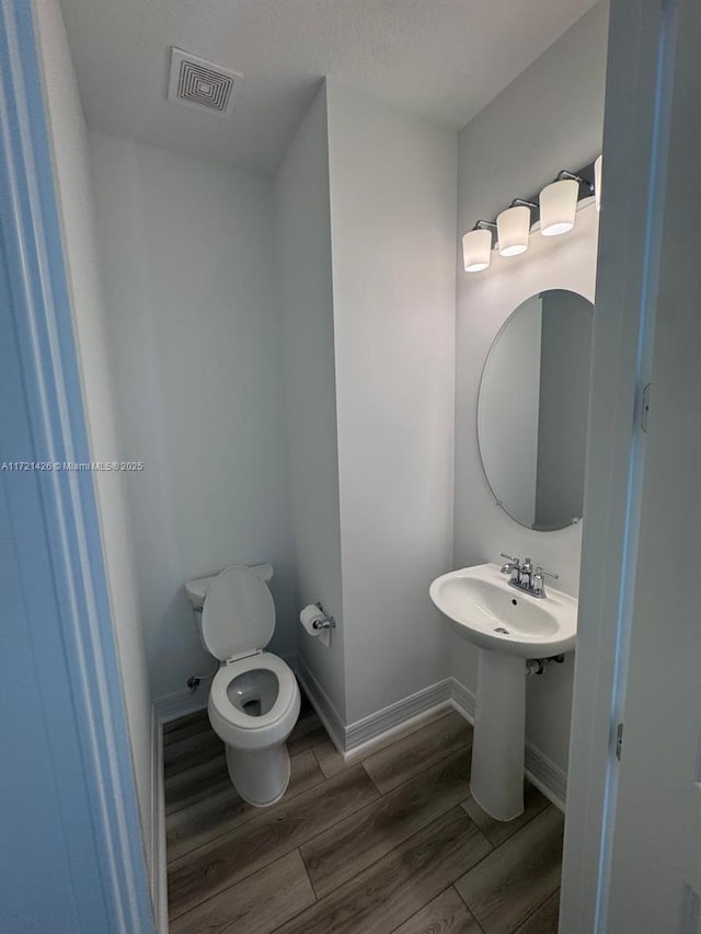 bathroom featuring toilet