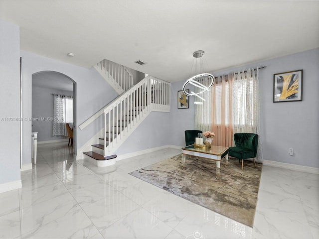 interior space with a chandelier