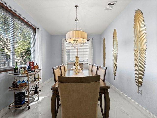 dining room with an inviting chandelier