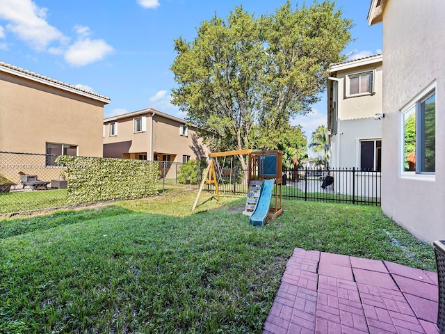 view of yard featuring a playground