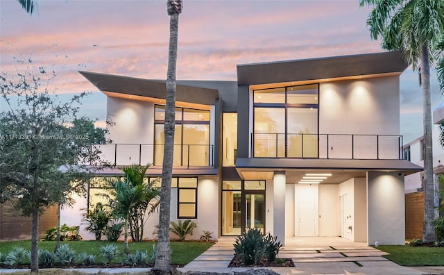 contemporary house featuring a balcony