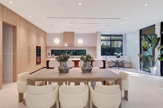 dining space with recessed lighting