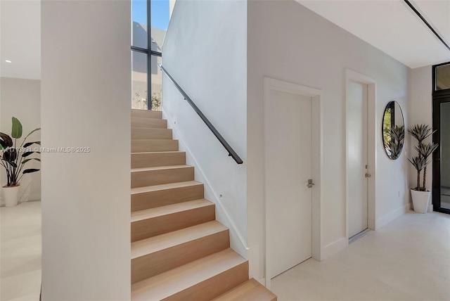 stairway with baseboards