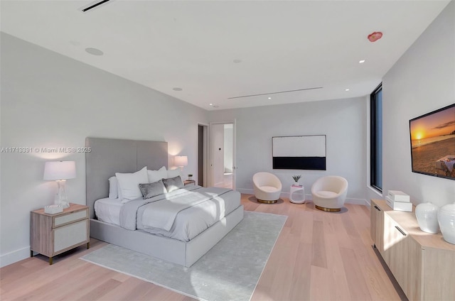 bedroom featuring light wood-style floors, recessed lighting, and baseboards