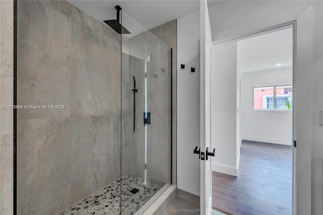 bathroom featuring tiled shower