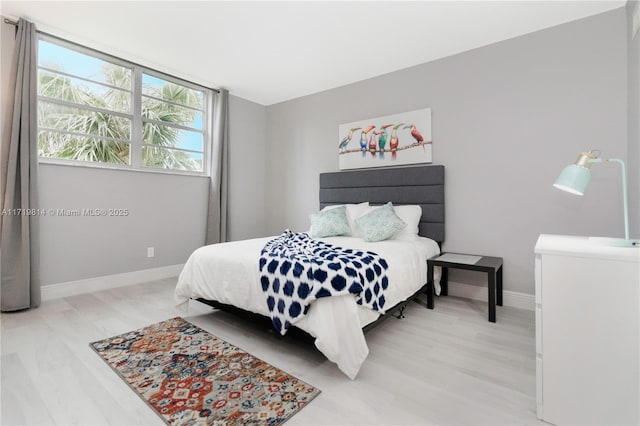 bedroom featuring wood-type flooring