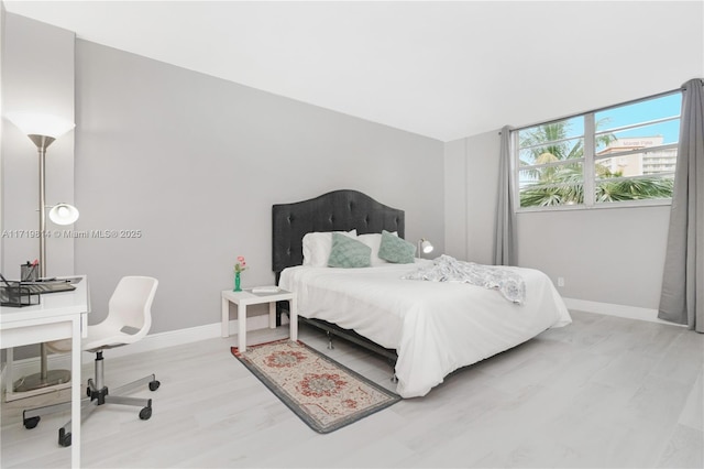 bedroom featuring light hardwood / wood-style flooring