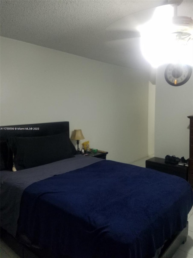 bedroom featuring a textured ceiling