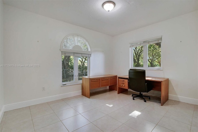 tiled office with a textured ceiling