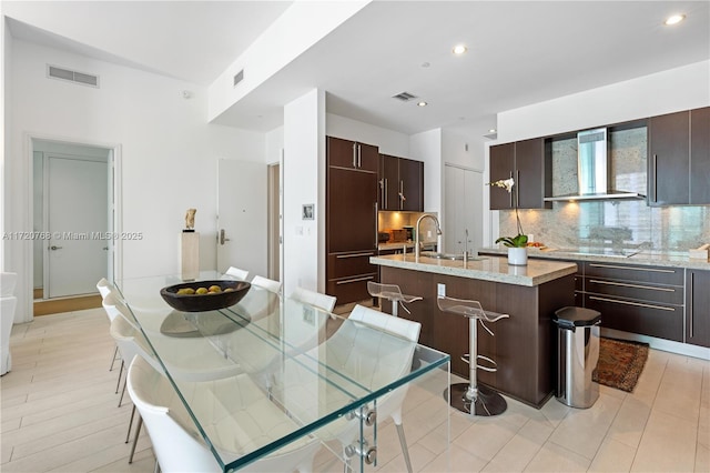 dining space featuring sink