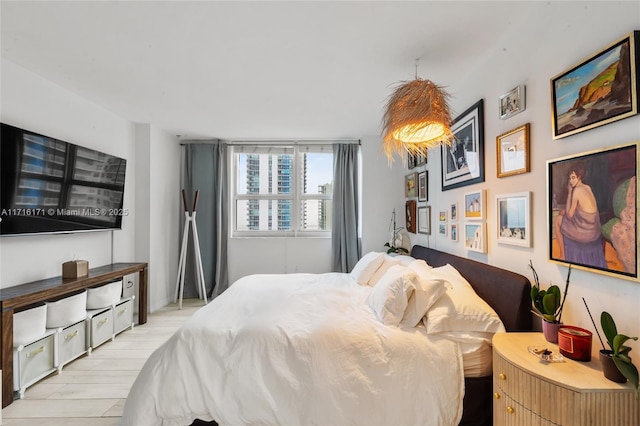 bedroom featuring light wood-type flooring