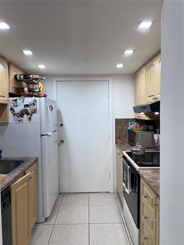 kitchen with light brown cabinets, sink, white appliances, decorative backsplash, and light tile patterned floors