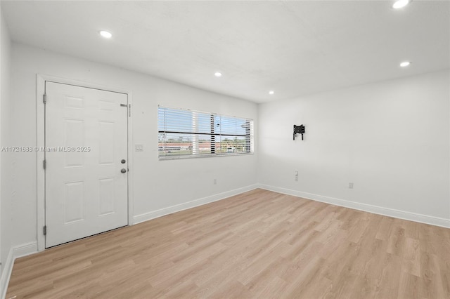 entryway with light hardwood / wood-style floors