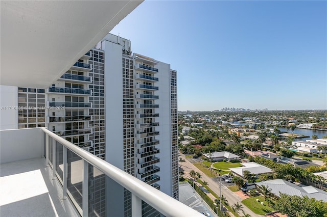 balcony featuring a water view