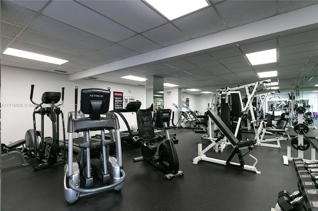 gym with a drop ceiling