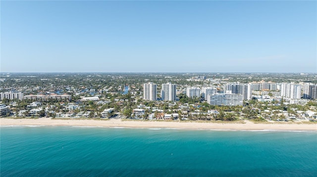 bird's eye view with a view of the beach and a water view