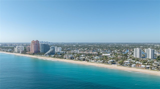 drone / aerial view with a view of the beach and a water view