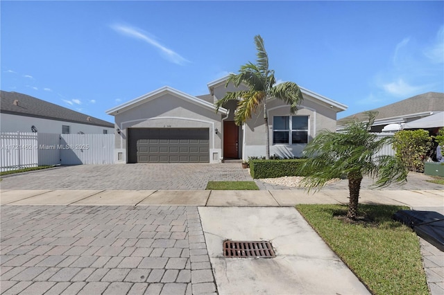 single story home featuring a garage