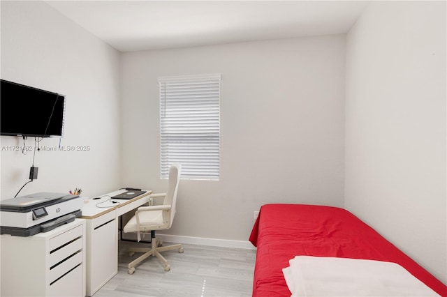 office area with light wood-type flooring