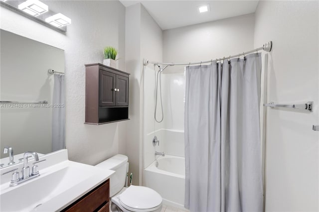 full bathroom with shower / bath combination with curtain, vanity, and toilet